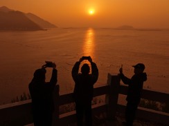 日出拍海
